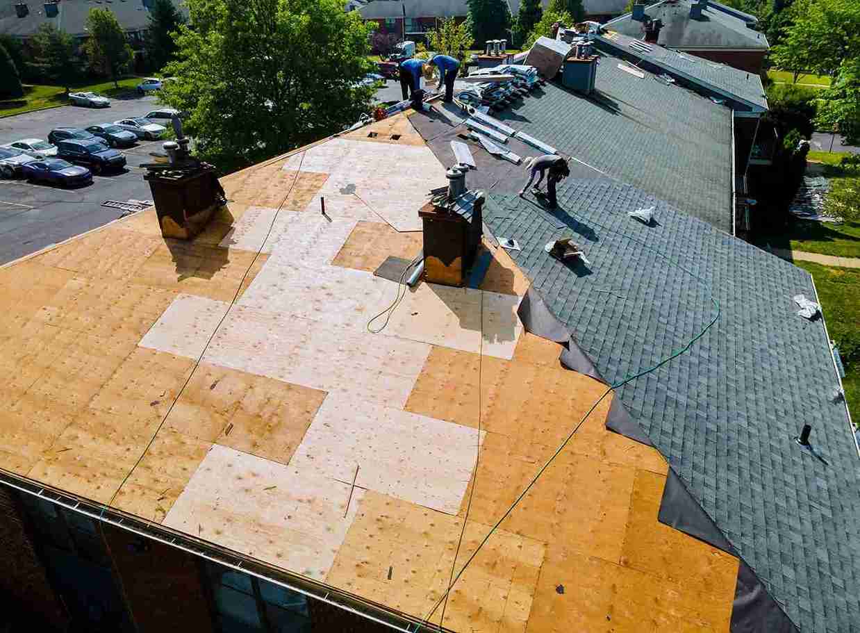 Roofer installing a new roof on a home in Austin, TX