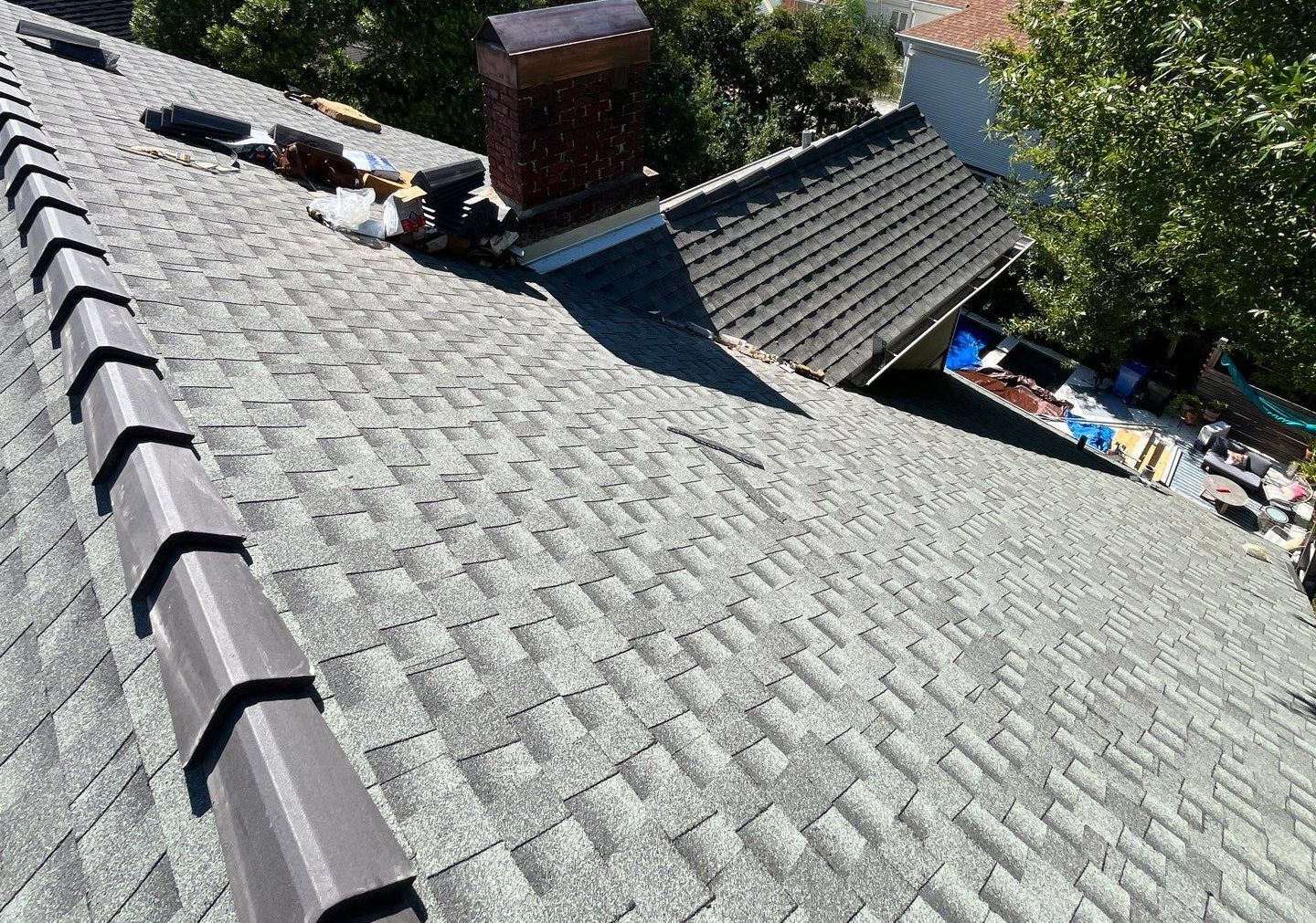 Commercial roofing team working on a large building in Austin, TX