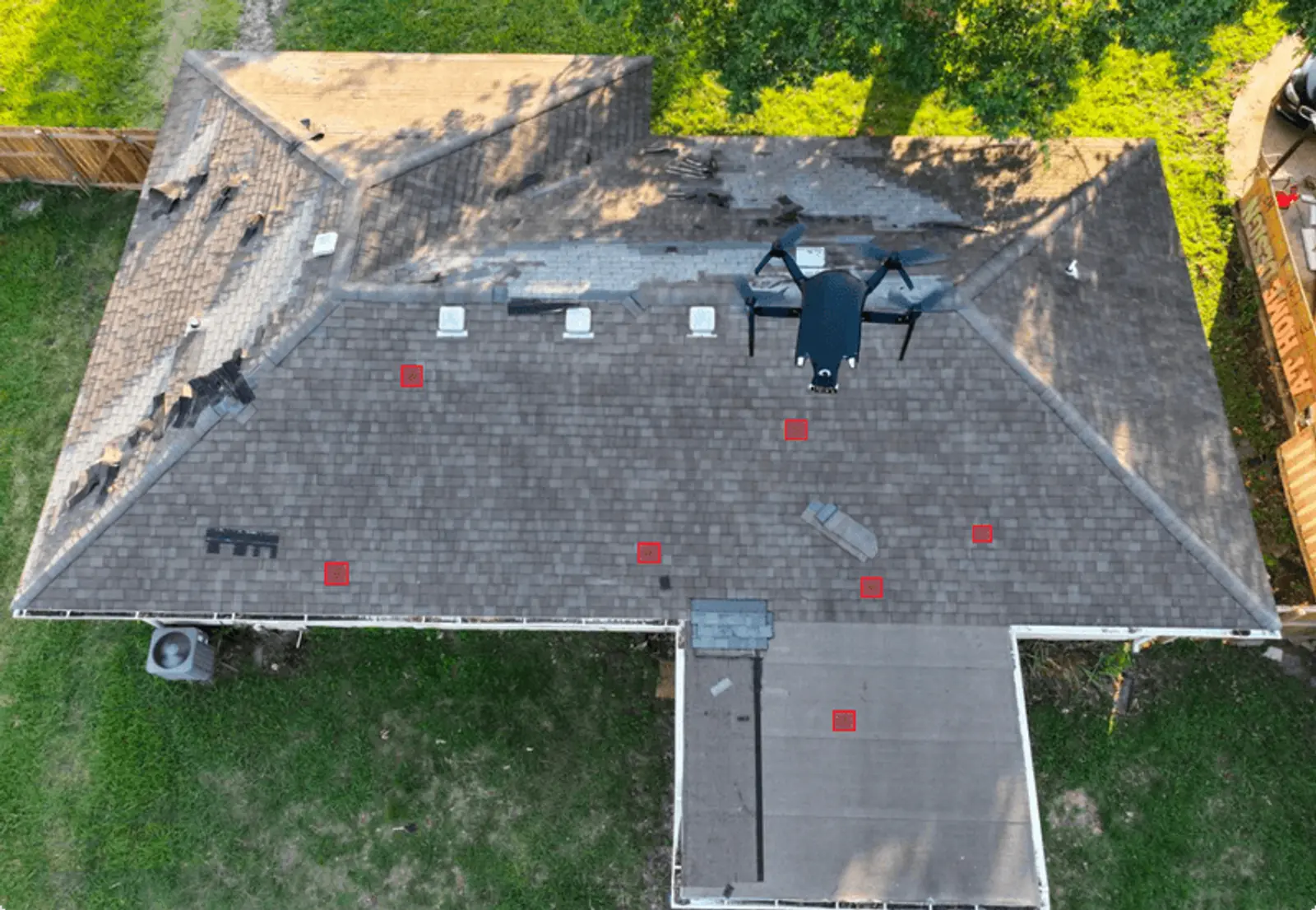 Trusted residential roofing team working on a home in Austin, TX