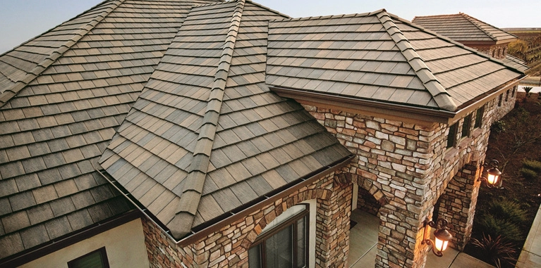 Skilled roofers repairing a residential roof in Colorado Springs, CO