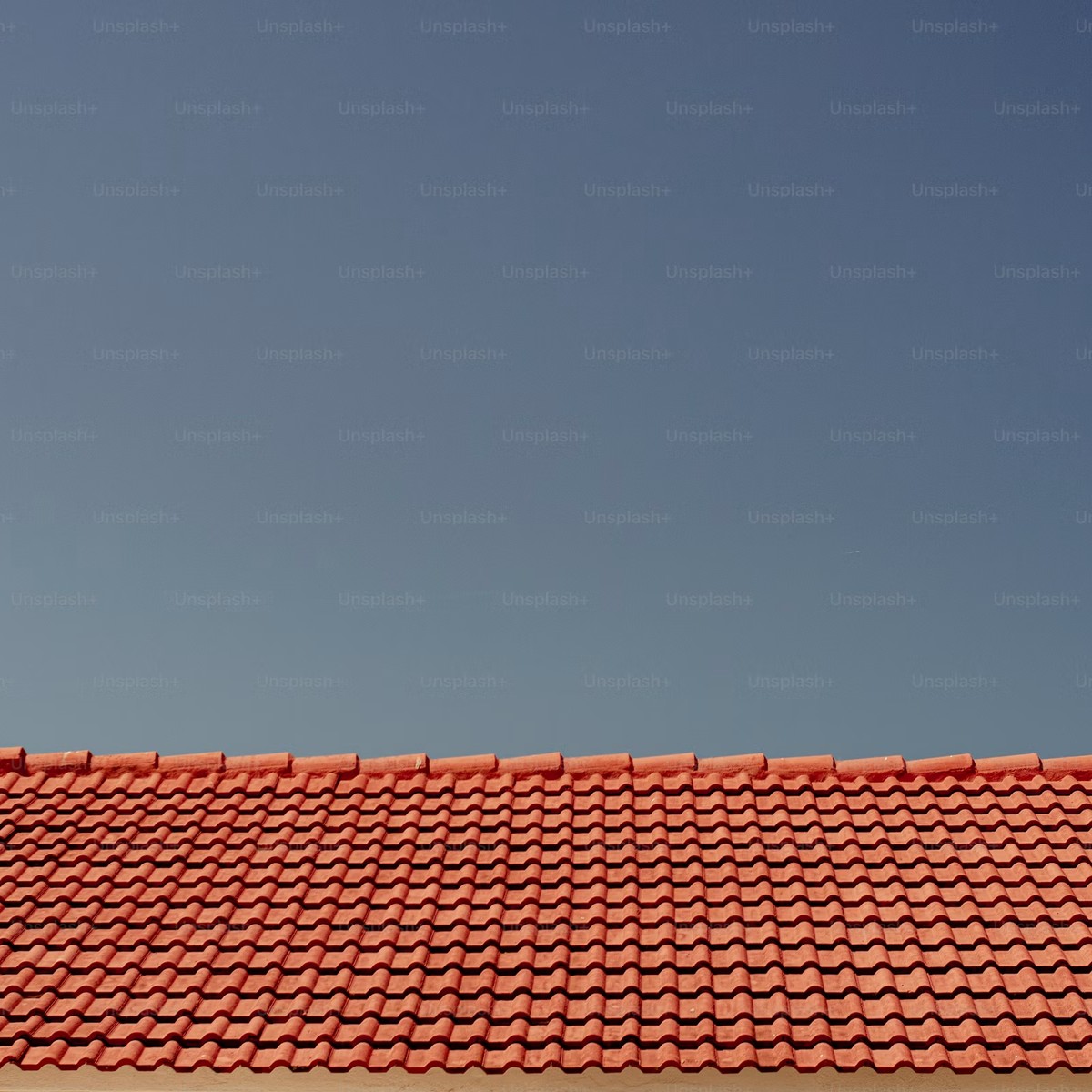 Clean red tile roofing under an open Colorado sky, representing Trusted Roofing Company in Broomfield, CO.