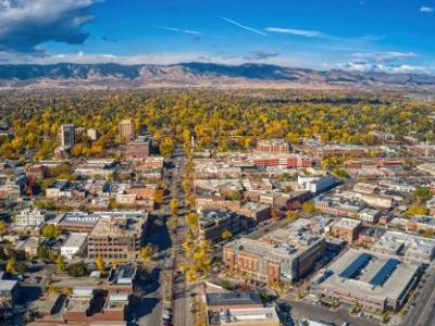 Professional roofer repairing a roof in Fort Collins, CO